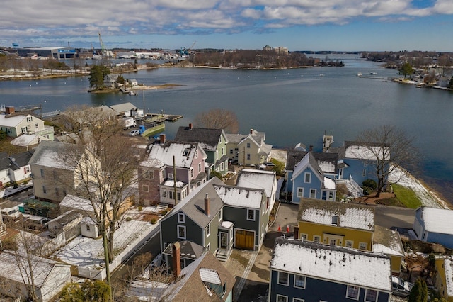 birds eye view of property featuring a water view and a residential view