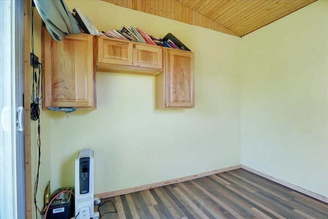 washroom featuring wooden ceiling and baseboards