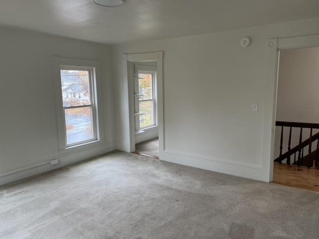 unfurnished room featuring carpet floors