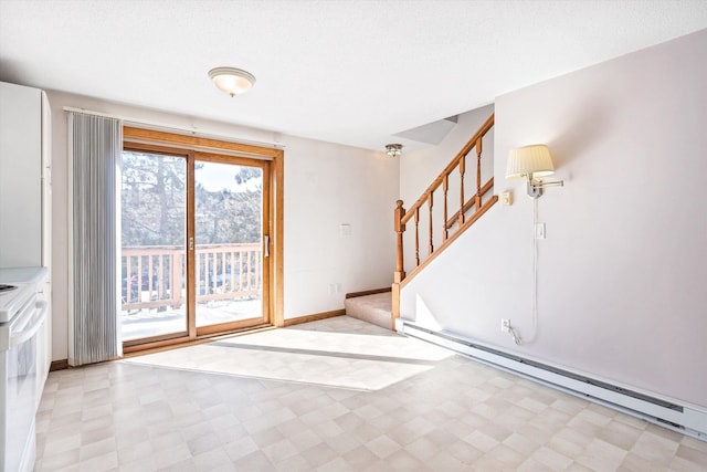 interior space with light floors, stairs, and baseboard heating