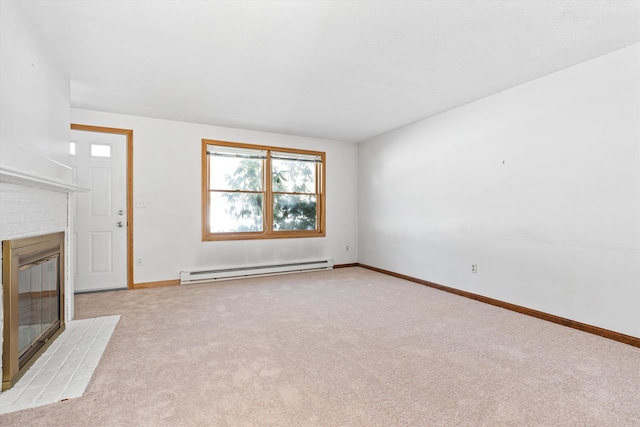 unfurnished living room featuring a baseboard heating unit, a fireplace, baseboards, and light colored carpet