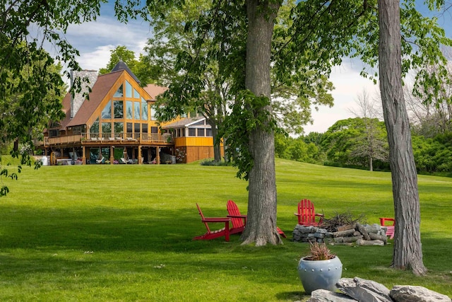 view of yard featuring a wooden deck