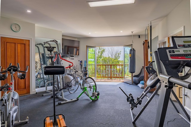 workout area featuring recessed lighting