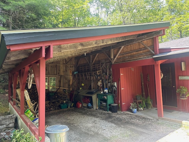 view of outbuilding with a carport