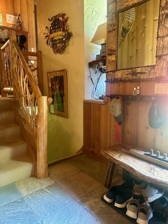 interior space featuring stone tile floors