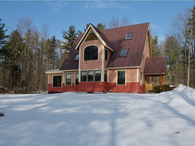 view of front of home featuring metal roof and a standing seam roof