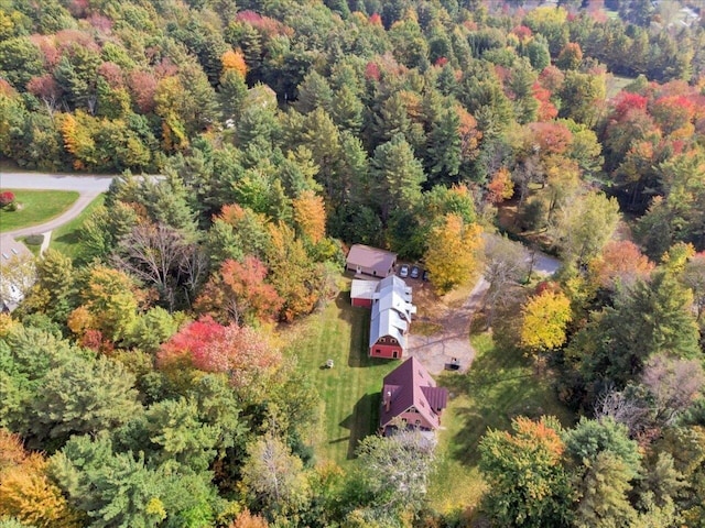 drone / aerial view featuring a view of trees