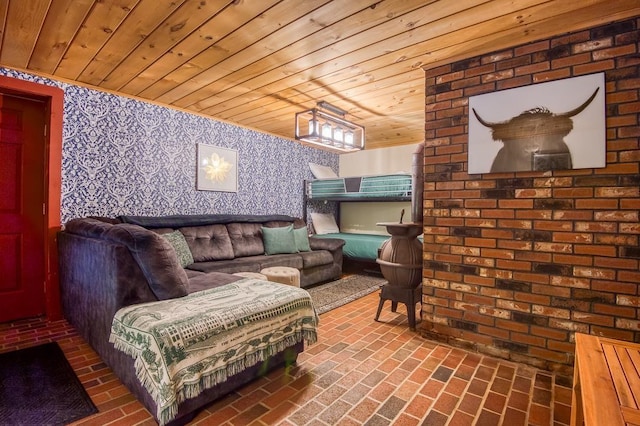 living area with brick floor, wood ceiling, and wallpapered walls