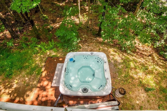 exterior details featuring a jacuzzi