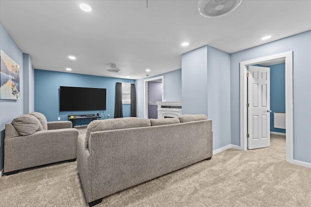 living area featuring baseboards, carpet flooring, and recessed lighting