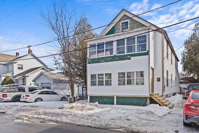 view of front of home with entry steps