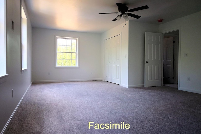 unfurnished bedroom featuring ceiling fan, a closet, carpet flooring, and baseboards