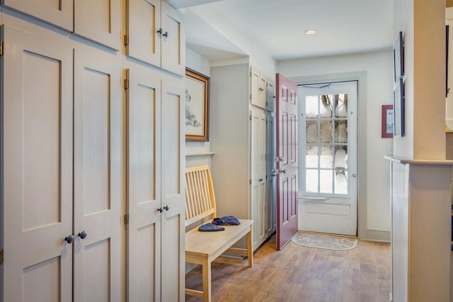 doorway to outside featuring light wood-style flooring