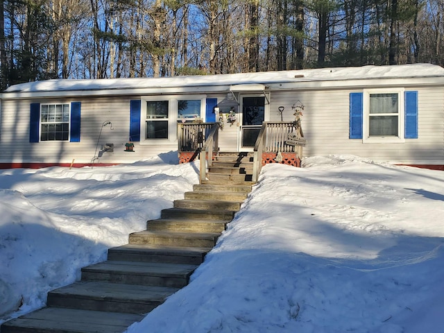 view of front of property with stairs