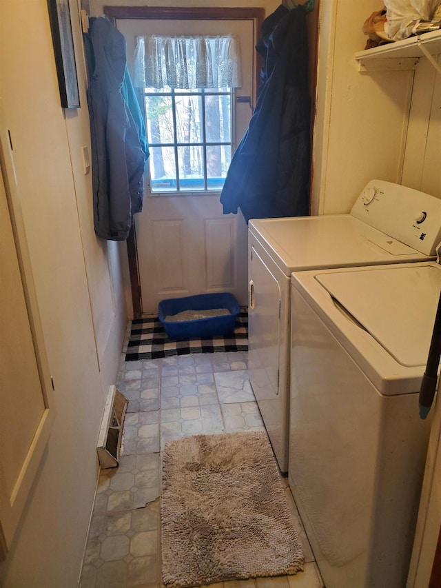 laundry area featuring washer and dryer, laundry area, and visible vents