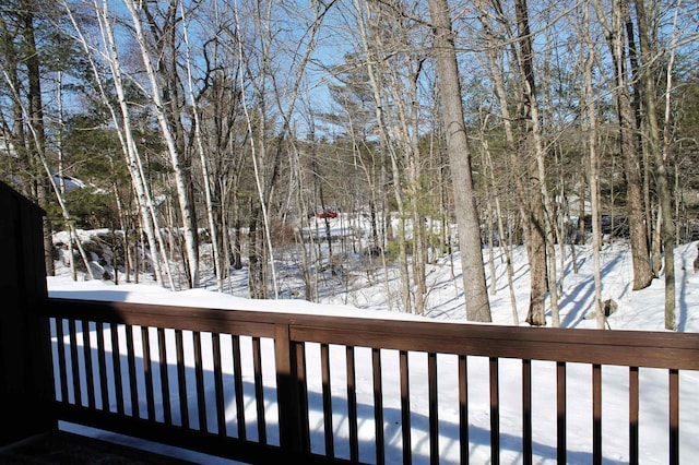 view of snow covered deck