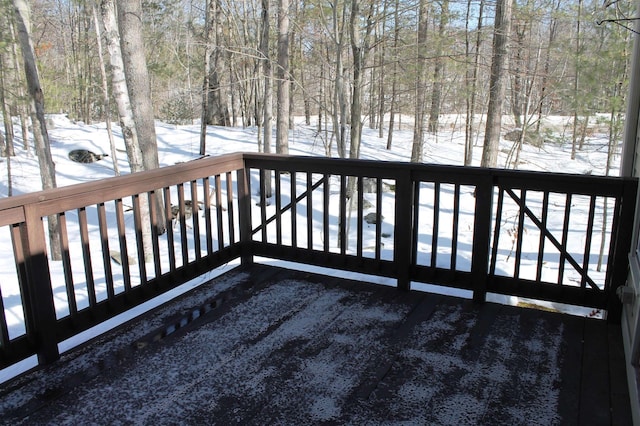 view of snow covered deck