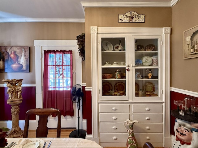 interior space featuring ornamental molding