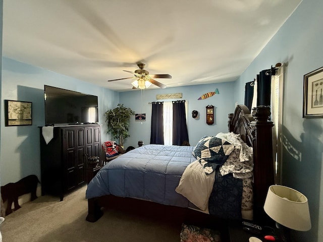 bedroom with carpet and a ceiling fan