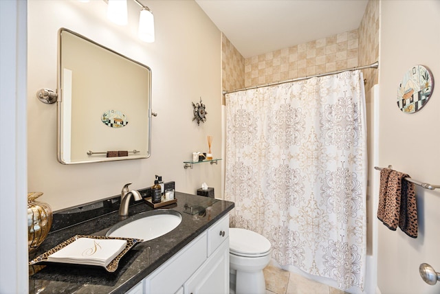 full bath featuring vanity, a shower with shower curtain, tile patterned flooring, and toilet