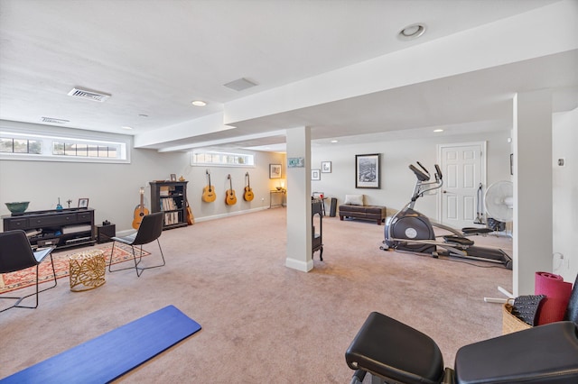 exercise area featuring recessed lighting, baseboards, visible vents, and carpet flooring