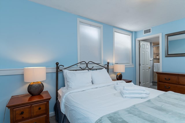 bedroom with visible vents