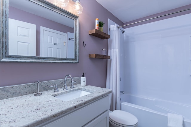 full bathroom with toilet, shower / bath combo, and vanity