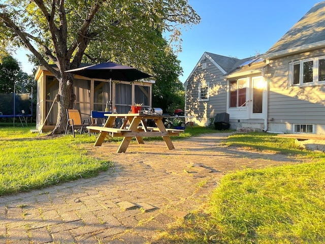 exterior space featuring a trampoline