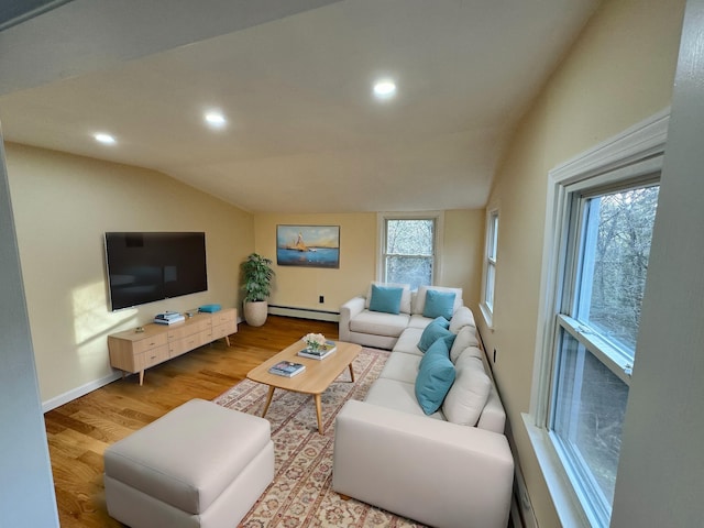 living room featuring a baseboard radiator, lofted ceiling, recessed lighting, and wood finished floors