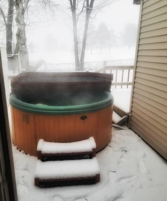 exterior space featuring a hot tub