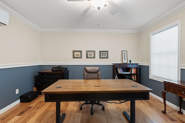 office featuring crown molding, light wood-style flooring, and a wall mounted AC