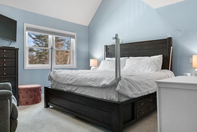 carpeted bedroom featuring vaulted ceiling