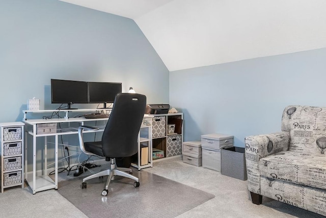 home office with lofted ceiling