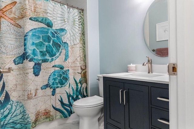 bathroom with toilet, marble finish floor, a shower with shower curtain, and vanity