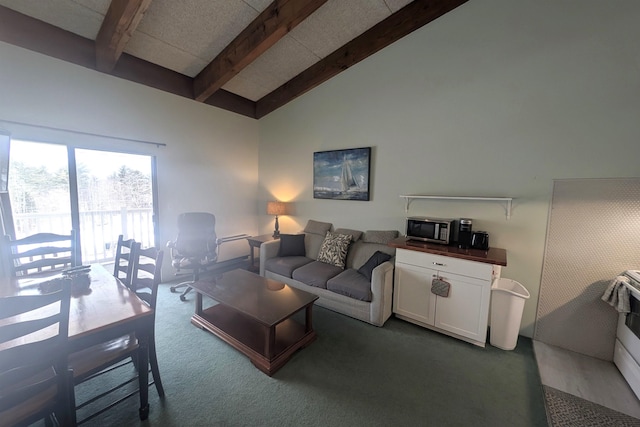 carpeted living room featuring beam ceiling and high vaulted ceiling