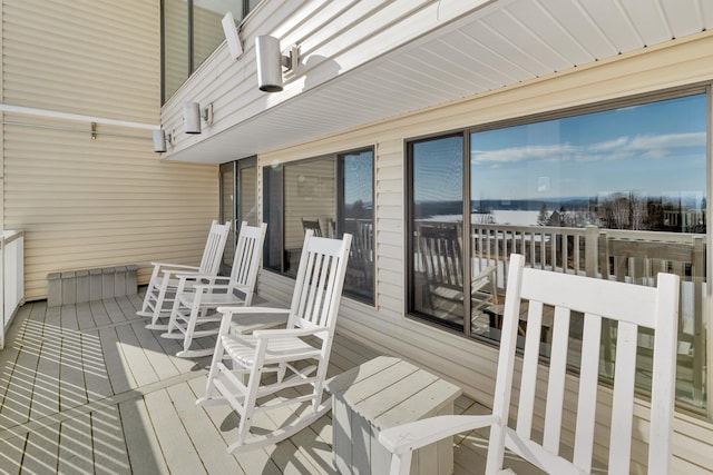 wooden terrace with a water view