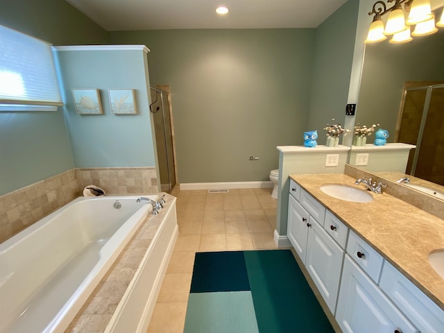 full bathroom featuring double vanity, a shower stall, a sink, and a bath