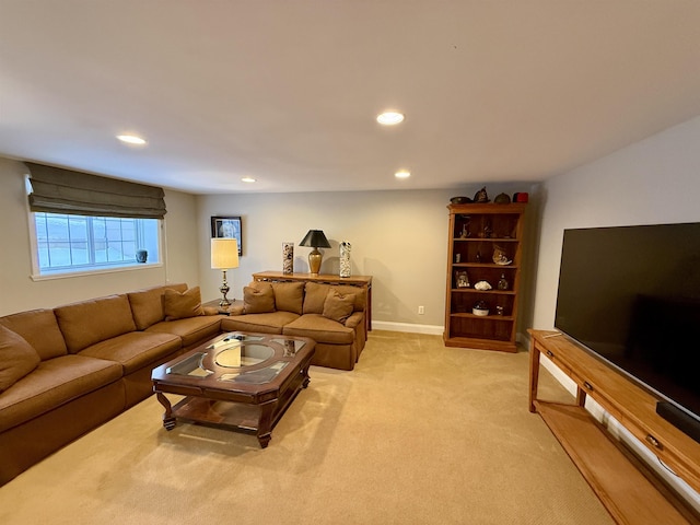 living room with baseboards, recessed lighting, and light colored carpet