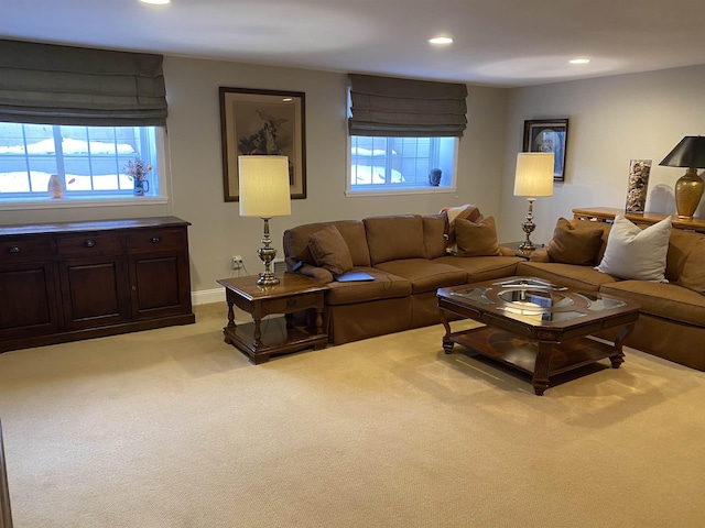 living room featuring carpet and recessed lighting