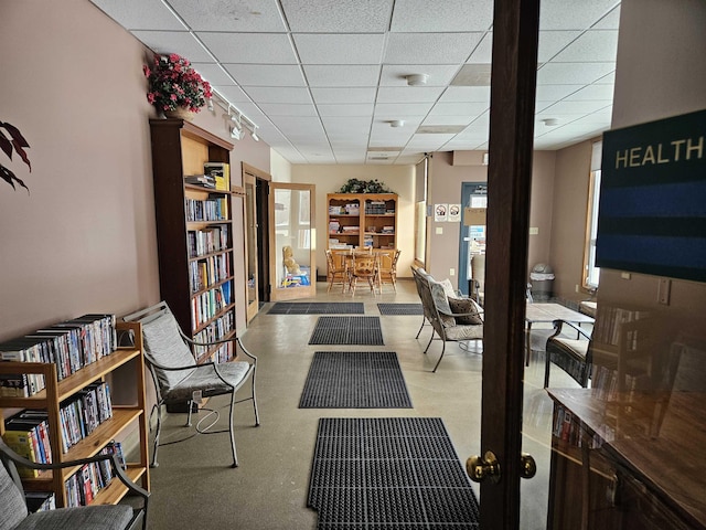 interior space featuring a drop ceiling