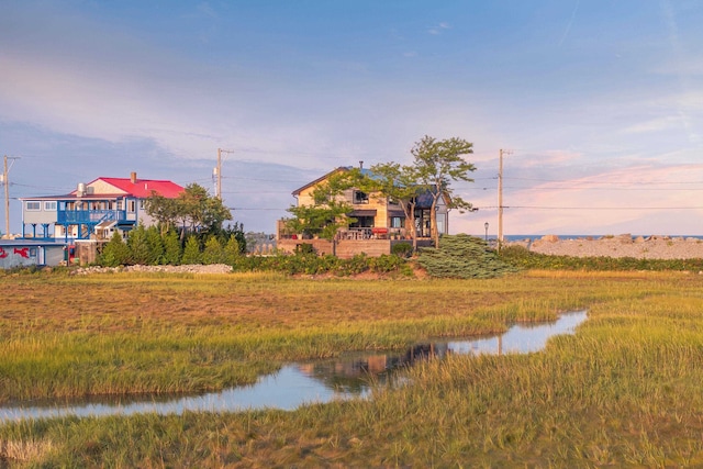 exterior space with a water view