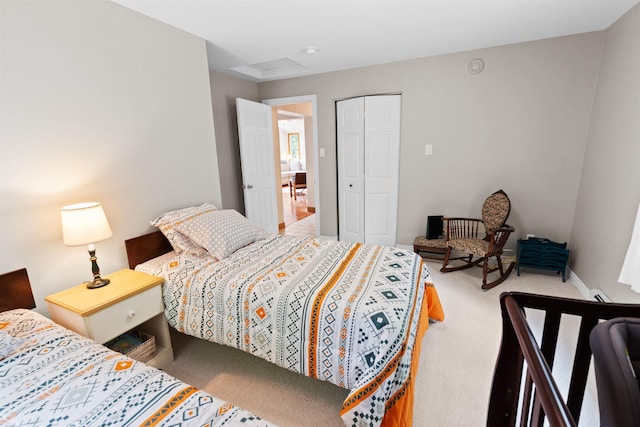 carpeted bedroom with a closet