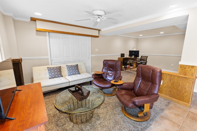 tiled living area featuring ceiling fan, recessed lighting, wainscoting, and crown molding