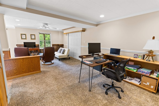 carpeted office space with ornamental molding, recessed lighting, wainscoting, and ceiling fan