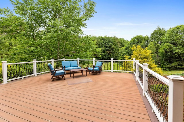 wooden terrace with outdoor lounge area