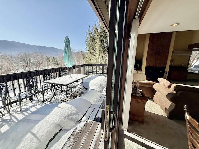 balcony featuring a mountain view