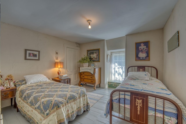 bedroom featuring light wood-type flooring