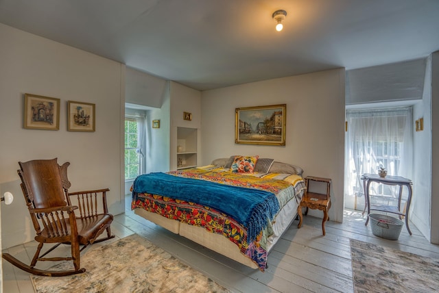 bedroom featuring hardwood / wood-style floors