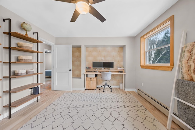 office with ceiling fan, light wood finished floors, a baseboard radiator, and baseboards