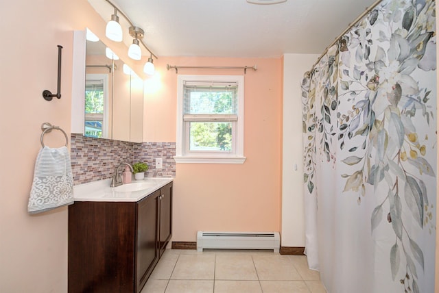 bathroom with tasteful backsplash, tile patterned floors, curtained shower, baseboard heating, and vanity